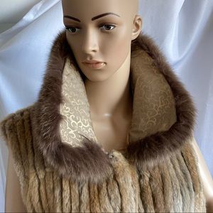 Vintage “fun fur” calf-length fur vest.